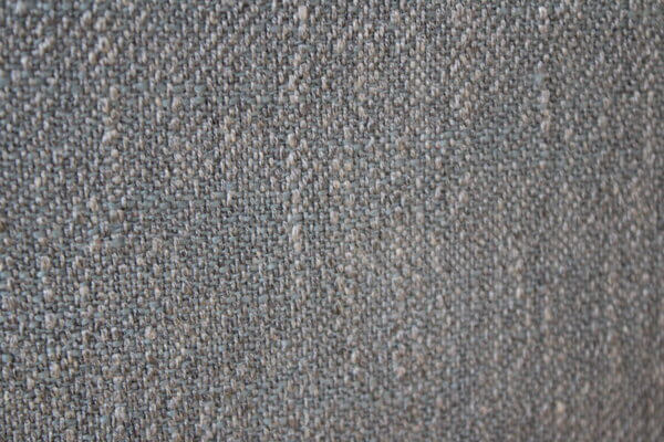 Grijs/blauw gemêleerd Chateau Mix gordijn, met subtiele kleurverschuivingen voor een eigentijdse look.