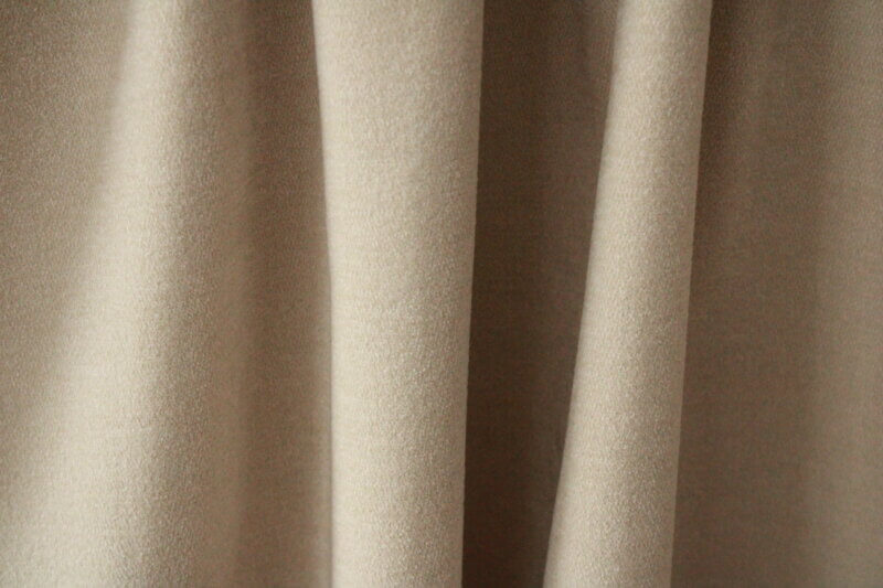 Ivoor Chenille gordijn, ideaal voor een chique en natuurlijke ambiance in het interieur.