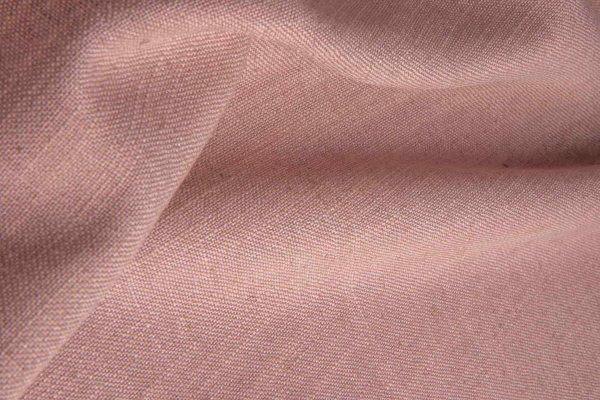 Sfeerfoto van de roze Elegance gordijnen, kleur JC2457 gordijnen met een zachte, warme roze tint en een effen stof voor een elegante en rustige sfeer in huis.