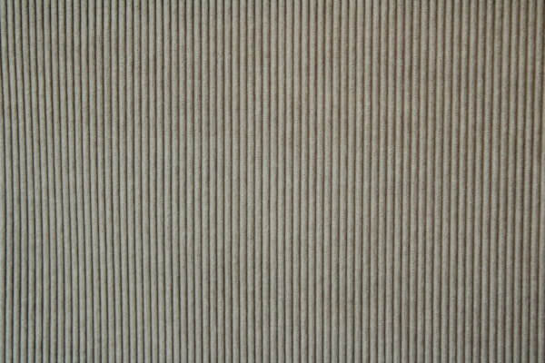 Detail van het parelgrijze Corduroy gordijn, jc2400 van okika. Toont de subtiele ribbelstructuur.