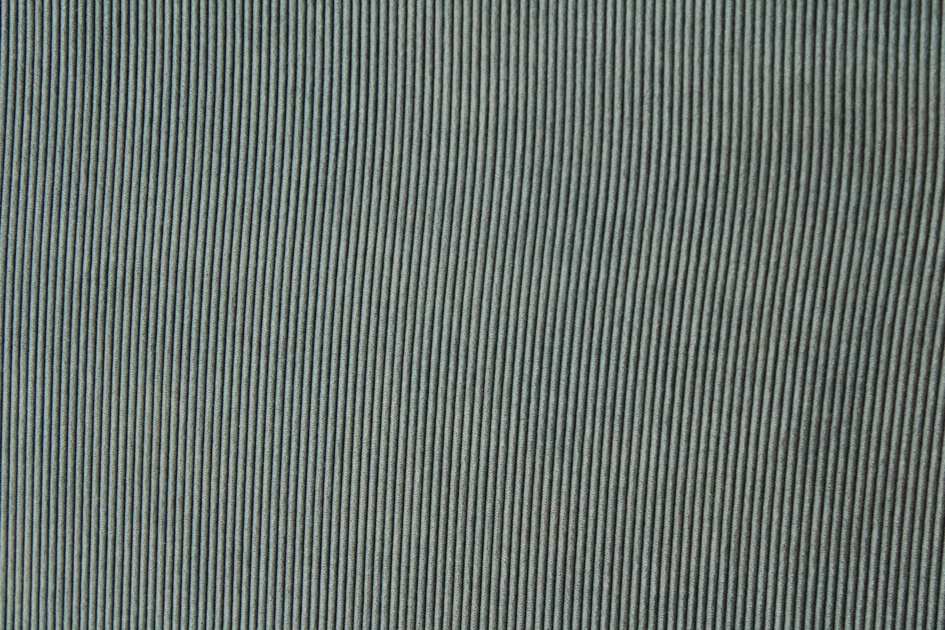 Detail van corduroy vintage groen gordijnstof JC2402