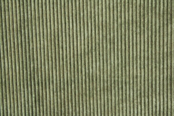 Detail van het zeegroene Corduroy gordijn, jc2406 van okika. Toont de hoogwaardige ribbelstructuur.