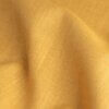 Elegance okerkleurige stof, bestaande uit polyester, viscose en linnen, met een levendige en luxueuze uitstraling.