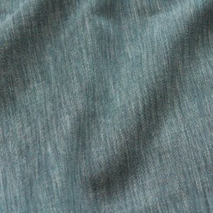 Zen Weave Indigo Blauw inbetween vouwgordijn met natuurlijke structuur en zachte lichtinval – elegante, duurzame raamdecoratie