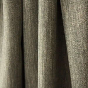 Vintage groen Zen Weave gordijn, vloeiend vallend, perfect voor een warme, natuurlijke sfeer.