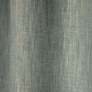 Close-up van de blauwe inbetween stof met fijne weving en subtiele lichtdoorlaat.