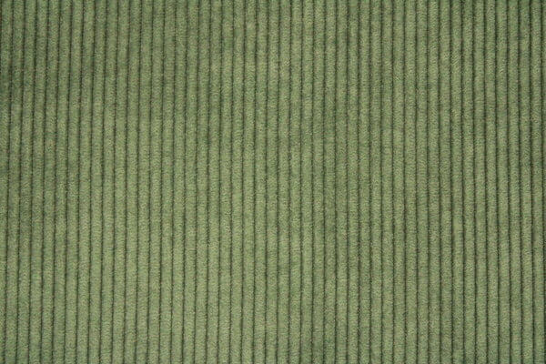 Corduroy vouwgordijn in zeegroen met ribstructuur, gemaakt van duurzaam polyester, ideaal voor intensief gebruik in een stijlvol interieur.