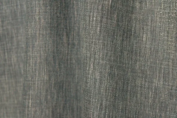 Sfeerfoto van indigo blauwe inbetween gordijnen met gemêleerde stof, lichtdoorlatend en perfect voor een moderne, sfeervolle uitstraling.