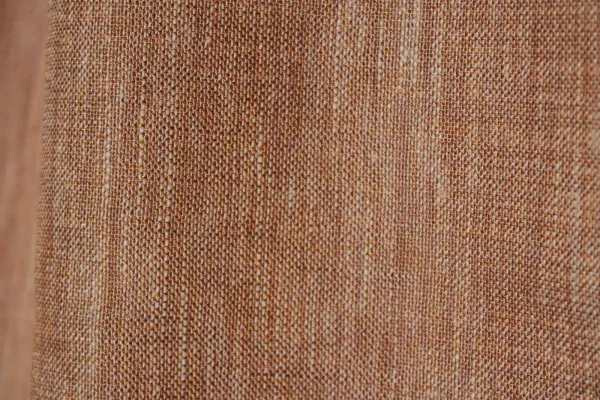 Close‑up van de nude inbetween stof JC2488 met fijne weving en subtiele lichtdoorlaat.