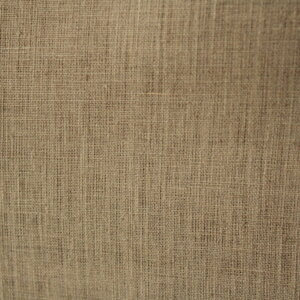 Detail van het beige linnen gordijn, laat de ademende stof en subtiele afwerking zien.