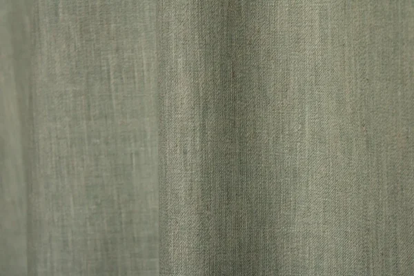 : Sfeerfoto van turquoise inbetween gordijnen uit de Zenweave collectie JC2484, lichtdoorlatend en stijlvol voor een frisse en moderne uitstraling