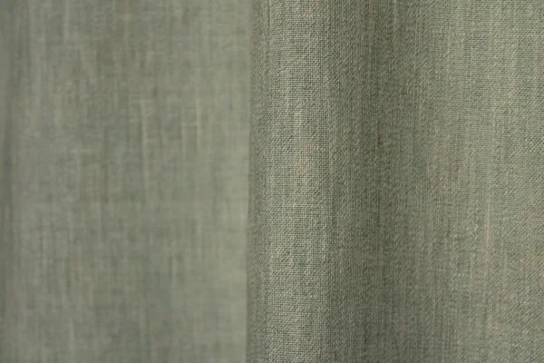Stofdetails van turquoise inbetween gordijnen uit de Zenweave collectie JC2484, met fijne weefstructuur en lichtdoorlatende afwerking.