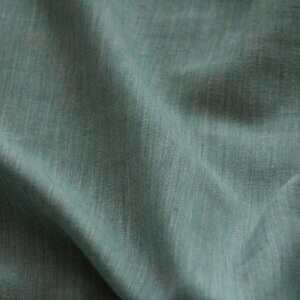 Zen Weave gordijnstof in een levendige turquoise tint, model JC2484 van Okika.