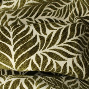 Structuur van jacquard chenille gordijnen in zachtgroen met ingeweven bladmotief, van dichtbij zichtbaar