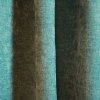 velours gordijnen met een krijtachtig effect, deze chenille structuur in de stof in het turquoise is een echte eye-catcher in het interieur