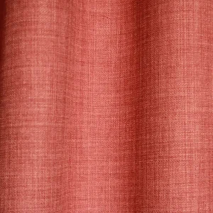 Sfeerfoto van terra gordijnen uit de Florain collectie (JC2532) van Okika, die een krachtig kleuraccent en een warme, natuurlijke sfeer toevoegen aan het interieur. stof is semi licht doorlatend en kleurvast.