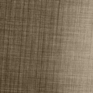 Close-up van de stofstructuur van taupe gordijnen uit de Florain collectie (JC2517) van Okika, met een fijne weving die het daglicht subtiel filteren