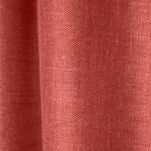 Detailfoto van de terra inbetween gordijnen uit de Saphira Light collectie van Okika, close-up van de geweven structuur.