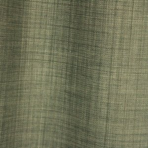 etailfoto van de stofstructuur van turquoise gordijnen uit de Florain collectie (JC2526) van Okika, met een subtiele weving die zorgt voor een frisse en levendige sfeer