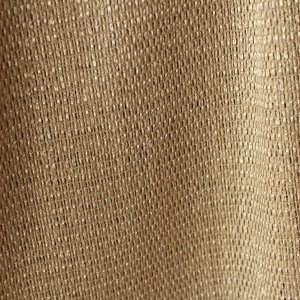 Beige inbetween gordijn Linea met grove weving. close up licht metallic glinstering in de stof