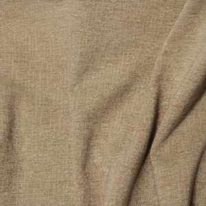 Stofstructuur van beige teddy chenille gordijnen van Okika, gefotografeerd op korte afstand.