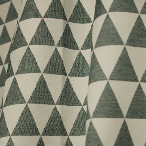 Stofpatroon van groen vintage gordijn met driehoekdesign.