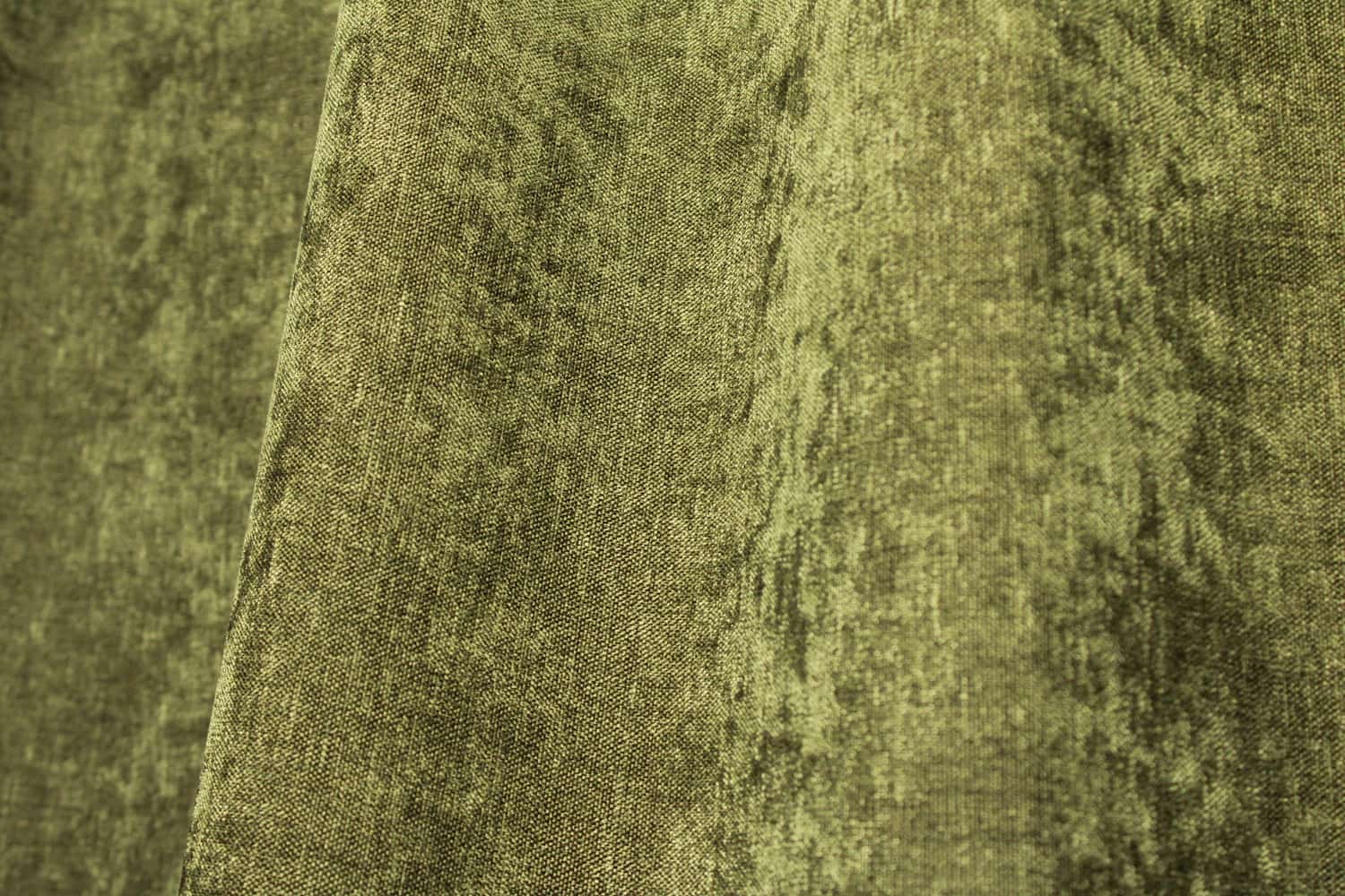 Stofpatroon van groene gordijnen met een zachte krijtlook, dicht chenille weving van de stof goed zichbaar