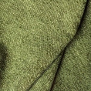 Stofdetails van groene gordijnen uit de Imperial collectie van Okika, close-up van de stofdetails