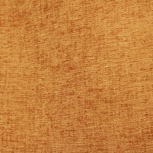 stofpatroon van okergele teddy chenille gordijnen van Okika, gefotografeerd in de plooi.