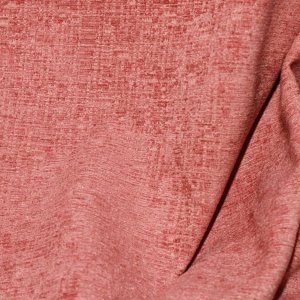 Stofstructuur van roze teddy chenille gordijnen van Okika, close up vastgelegd met zicht op de weving.