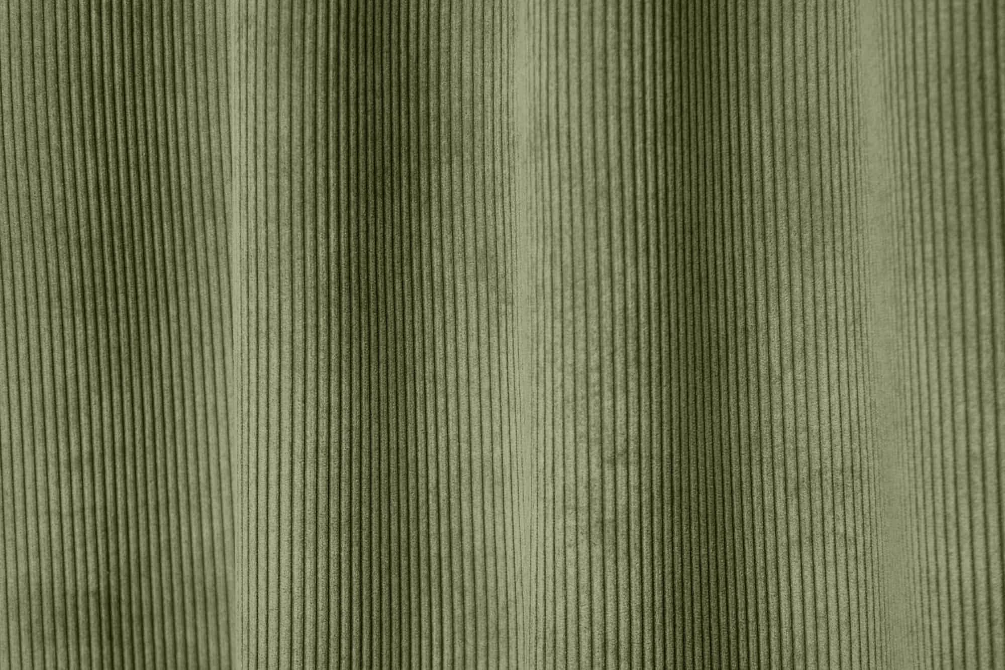 Close up van zeegroene ribstof gordijnen met ribstructuur