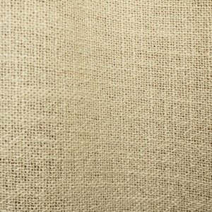 stofpatroon van crèmekleurige gordijnen uit de Boucloir collectie JC2603, detail van de semilichtdoorlatende stof waarbij de weving zichtbaar is.