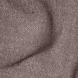 Detail van de stofstructuur van donker taupe gordijnen uit de Boucloir collectie JC2591, met een duidelijke overtwist garen weving