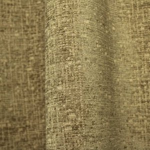 details van de groene gordijnen uit de teddy chenille collectie van okika. stofdetails