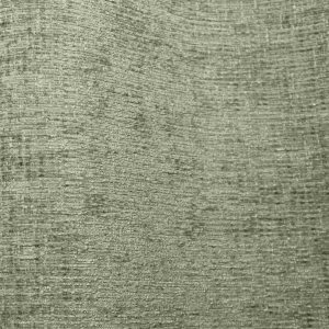 Stofdetails van mintgroene teddy chenille gordijnen van Okika, waarbij de volle, zachte teddy structuur en gelijkmatige chenille weving goed zichtbaar zijn bij daglicht