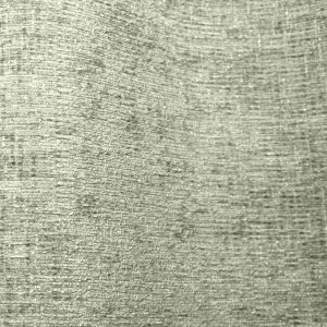 Stofdetails van mintgroene teddy chenille gordijnen van Stofpatroon van mintgroene teddy chenille gordijnen van Okika, met de nadruk op de plooival en het rustige, egale teddykarakter van de stof bij natuurlijk licht.