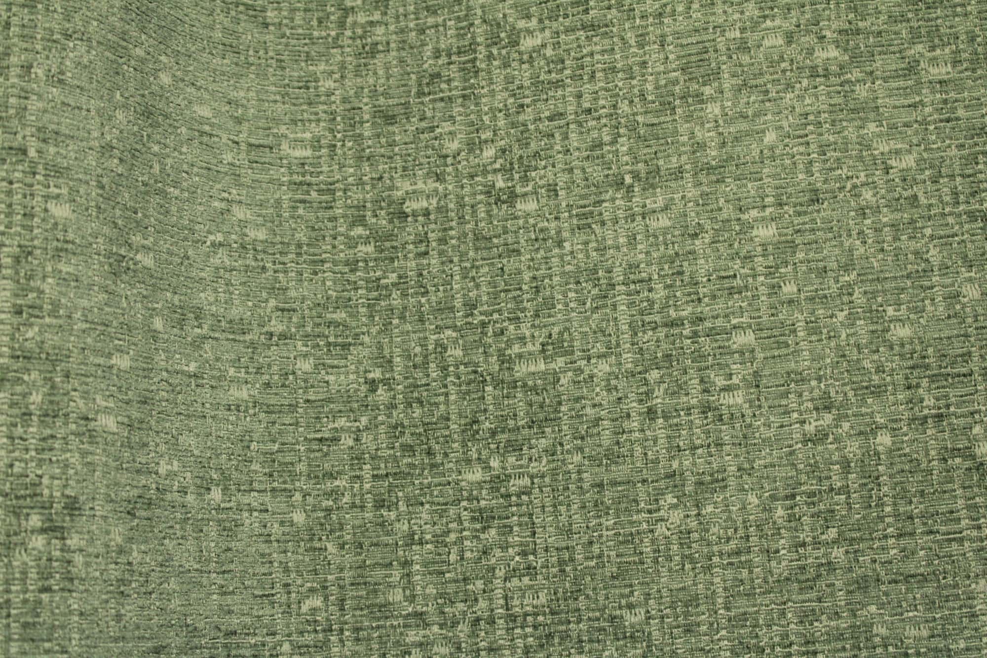 Stofpatroon van zachtgroene teddy chenille gordijnen van Okika, gefotografeerd in de plooi met zachte teddy achtige stof goed in beeld