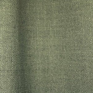 Close-up van de stofdetails van zeegroene gordijnen uit de Boucloir collectie JC2610, natuurlijke textuur en structuur zichtbaar in de plooien van het gordijn.