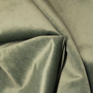 De stofstructuur van de groengrijze velours Noble collectie SYM2681 toont een dichte, fluweelzachte stof