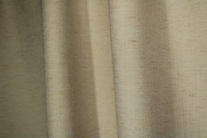 verduisterende linnenlook ivoor gordijnen sfeer foto van de gordijnen die hangen in deplooi