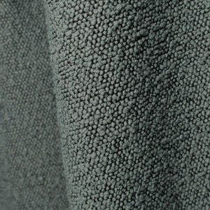 Stofdetail van donkerblauwe bouclé gordijnen met volle textuur