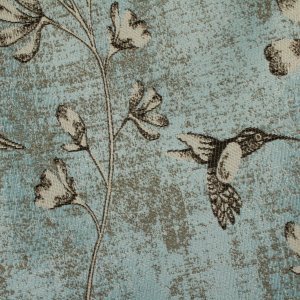 Close up stofdetails van blauwe jacquard gordijnstof met vogels