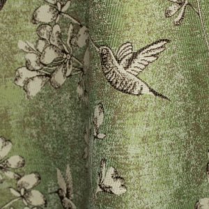 groene gordijnstof met ingeweven vogels patroon jacquard stofdetails