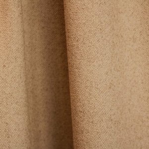 Beige Soft Bouclé gordijnen met een natuurlijke linnenuitstraling en subtiele boucle structuur.