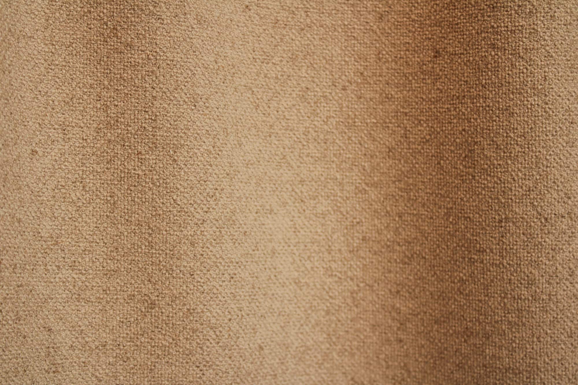Beige Bouclé gordijnen waarbij de subtiele lusjes en linnenstructuur goed zichtbaar zijn. soft boucle collectie