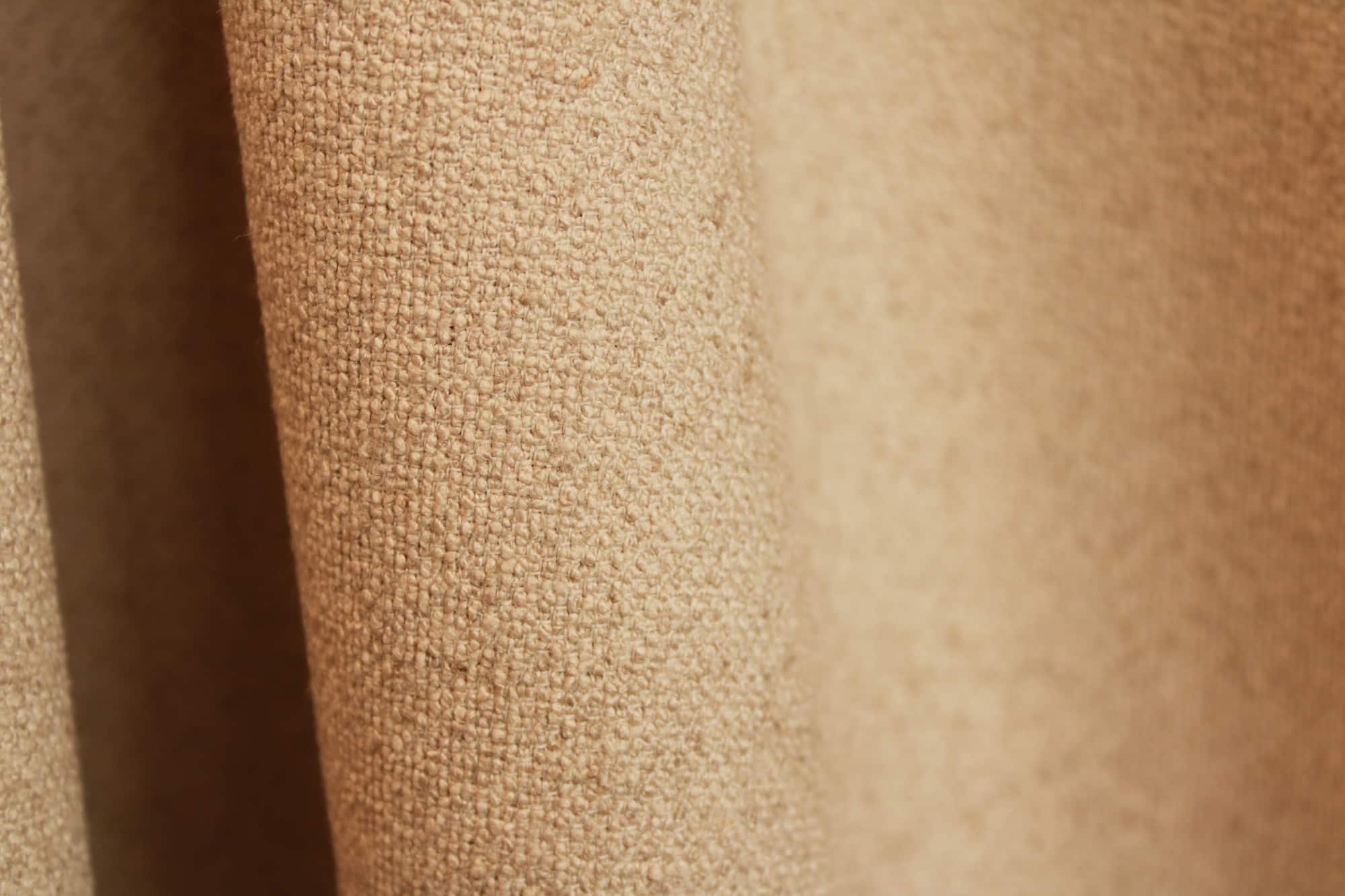 Stofpatroon van beige Soft Bouclé met een natuurlijke linnen uitstraling.