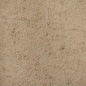 Ivoorkleurige Soft Bouclé stofdetails met een fijne linnenstructuur en subtiele lusjesweving goed zichtbaar