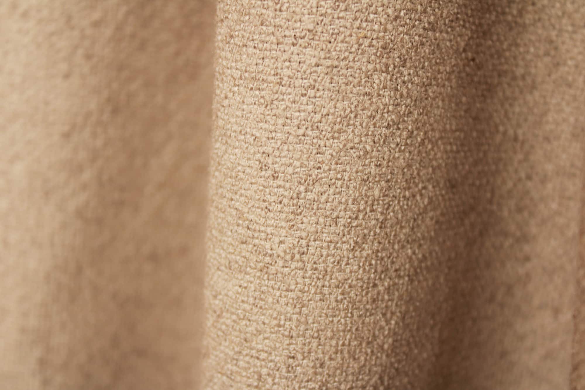 Stofpatroon van taupekleurige Soft Bouclé met een natuurlijke linnenuitstraling.